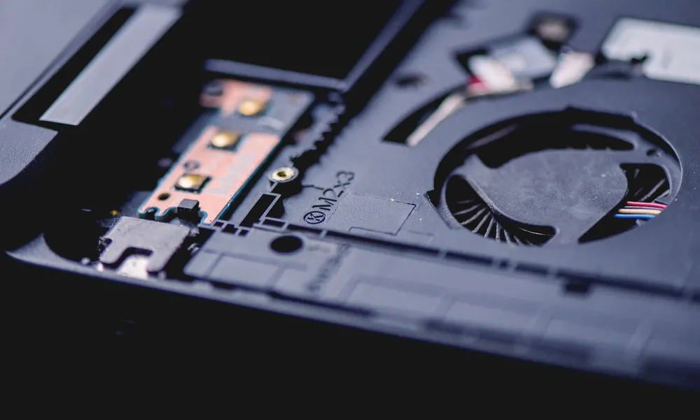 Inside of a laptop opened for repair, where Keylink IT got its start in 1993